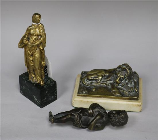 A Baroque or later gilt bronze figure of Virgin Mary, a bronze cherub and a bronze lion paperweight tallest 16cm